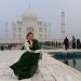 Taj Mahal visit with the fountain as a central piece sari India tourist