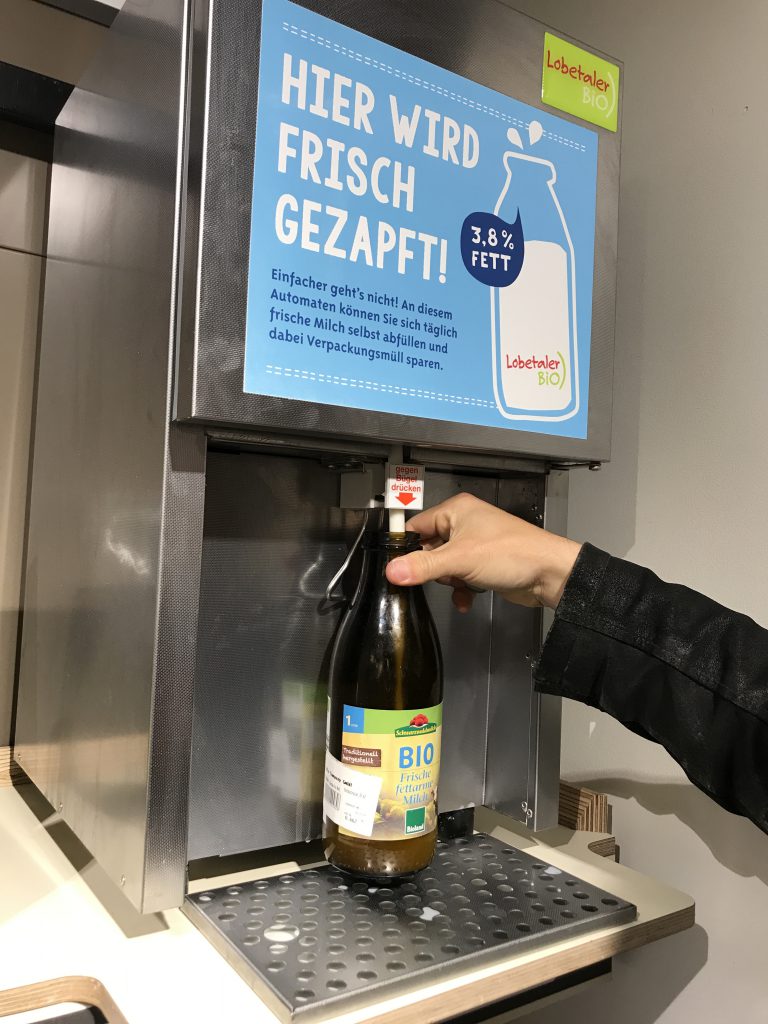 milk on the tap in Bio Company berlin in order to avoid milk packaging and usage of plastic