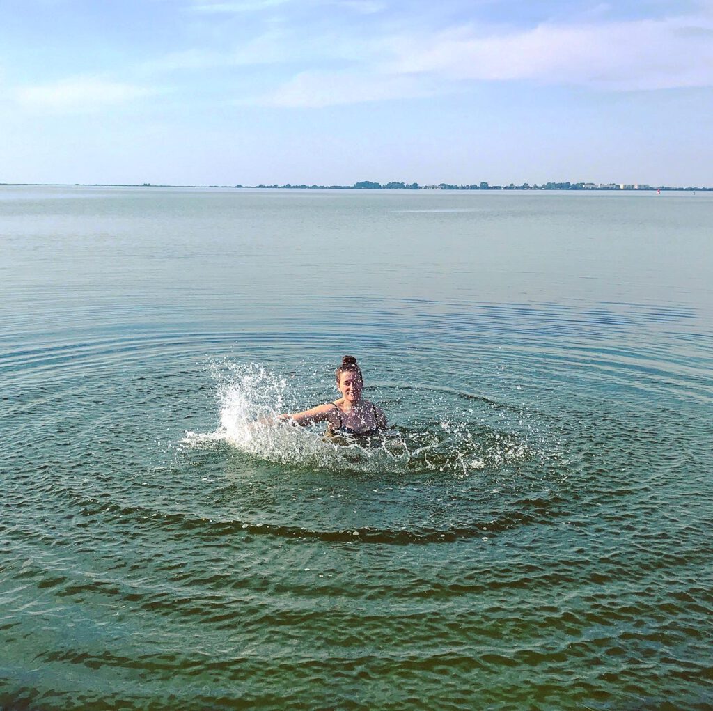 swimming in the baltic sea during the summer vacation on ruegen germany